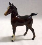 A Beswick Model of an Arab foal (brown finish, Model 1407), 4 ½” high
