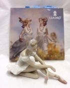 A Lladro Model of a ballerina with a flower posy in her left hand; and a further Lladro Catalogue