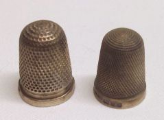 A Mixed Lot comprising: two various hallmarked Silver Thimbles, various dates and makers (2)