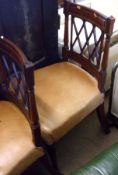 A set of six early 19th Century Mahogany Bar Back Dining Chairs, all with pierced latticed splat