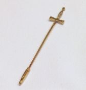 An attractive early 20th Century Stick Pin, in the form of a sword with small old cut Diamonds to