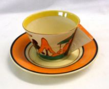 A Clarice Cliff “Trees and House” pattern Conical Cup and Saucer, orange colourway