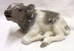 A Royal Copenhagen Model of a calf, decorated in naturalistic colours, 6” long