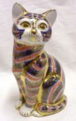 A Royal Crown Derby Paperweight modelled as a seated cat (button missing), 5” high