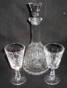 A Suite of Waterford Crystal, comprising a covered bell-shaped Decanter and six Stemmed Wines with