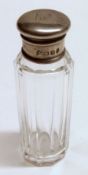 An Edward VII Perfume Flask, the clear facetted cylindrical body with screw-down cover, marked for