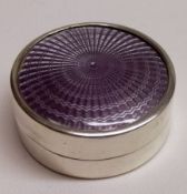 A George V Silver and Enamel Powder Compact of cylindrical form, the lid with engine-turned