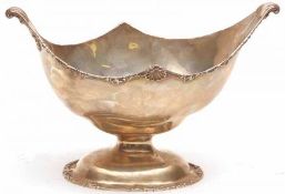An Edward VII Footed Bowl, of crescent form with cast and applied floral and foliate border to a