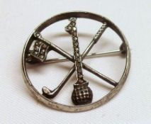 Of Golf Interest – a Marcasite mounted circular openwork Brooch featuring the numeral 1 on a golf