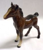 A Beswick foal (medium, almost stood square, No 1084, brown finish), 4 ½” high