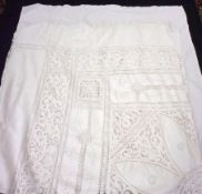 A large early 20th Century Cotton Whitework Bedspread or large Tablecloth, with extensive cut-work