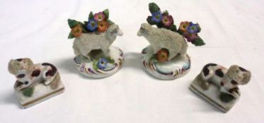 A pair of small Staffordshire Models of poodles, treacle body markings on gilt lined bases; and a