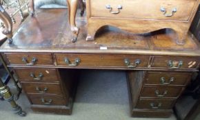 A Mahogany Twin Pedestal Desk with triple tooled rexine insets, and with three frieze drawers over