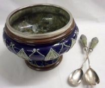 A Royal Doulton Stoneware Salad Bowl with a hallmarked Silver rim; together with a pair of