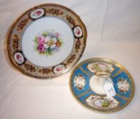 A Noritake Cake Plate of circular form with central handle, the border painted in colours with