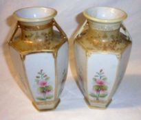 A pair of two-handled Hexagonal Baluster Vases of tapering form, painted with panels of foliage on a