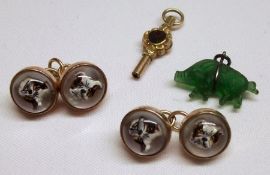 A pair of gilt metal framed Essex type bulldog head Cufflinks, Watch Key and green glass Pig Pendant