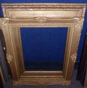 WATTS TYPE GILT GESSO PICTURE FRAME, 13 ½” x 19 ½”; together with a SWEPT GILT GESSO PICTURE
