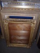 GROUP OF FIVE VICTORIAN AND LATER GILT GESSO PICTURE FRAMES, the largest 15 ½” x 23” (5)