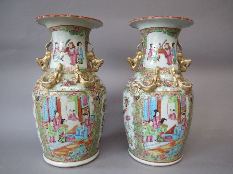 Pair of Chinese canton enamel porcelain baluster vases decorated with panels of figures, applied