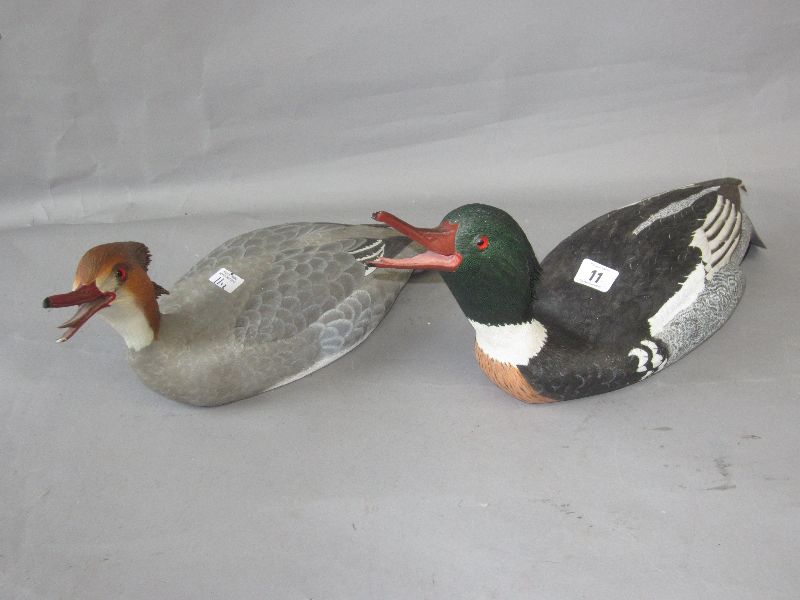 Pair of male & female Merganser hand carved & painted ducks by Albert Helding