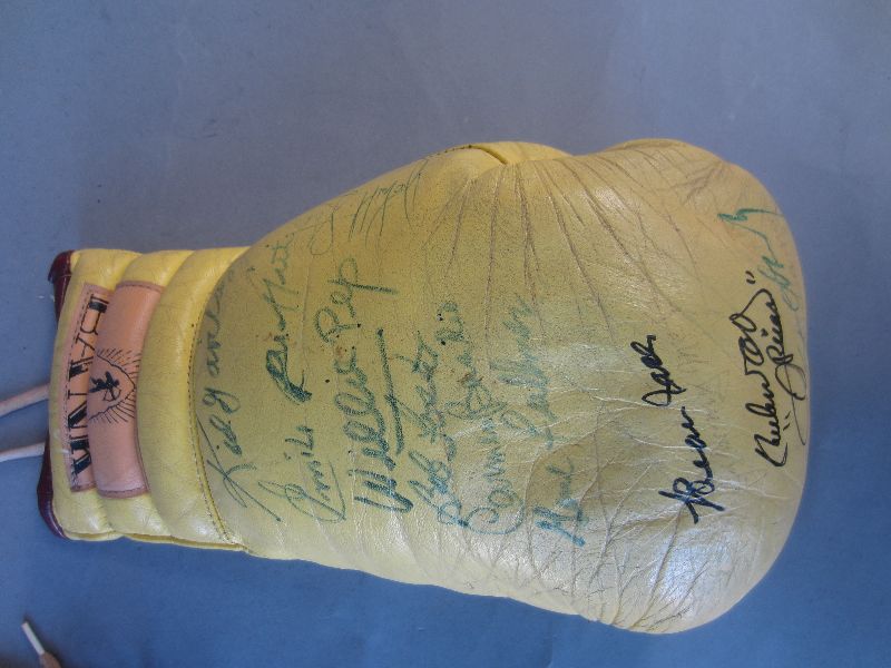 Boxing glove signed by 12 world champions; Jimmy McLarnin, Beau Jack, Ike Williams, Carlos Ortiz,