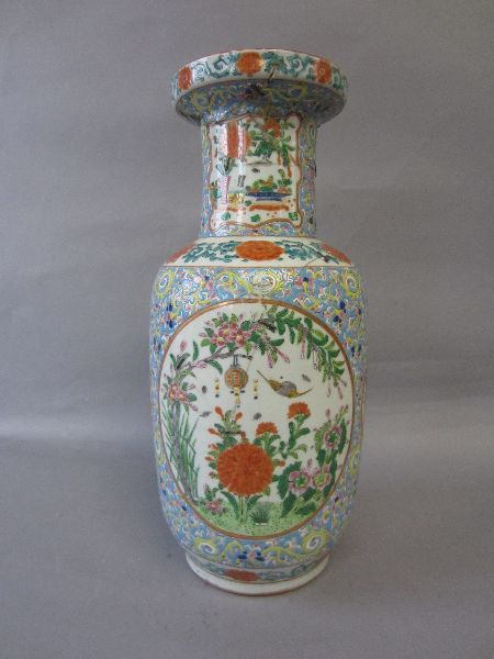 Chinese Rouleau vase decorated floral reserves to a pale blue ground (a/f) 36h