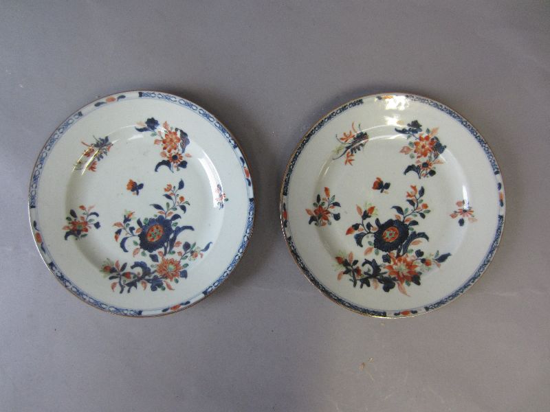 Pair of Chinese famille rose plates decorated in Imari colours