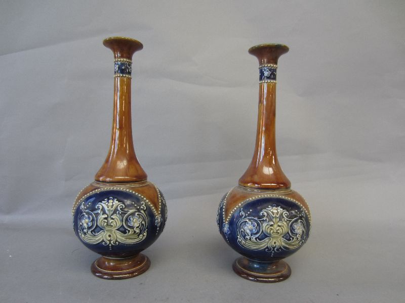 Two Royal Doulton bottle neck vases