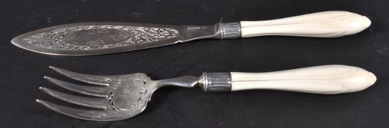 Pair of Victorian engraved & pierced fish servers with ivory handles London 1875. Maker The