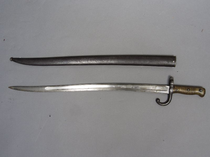 French bayonet No 81128 with brass ribbed handle with inscription & dated 1872 on the blade, in