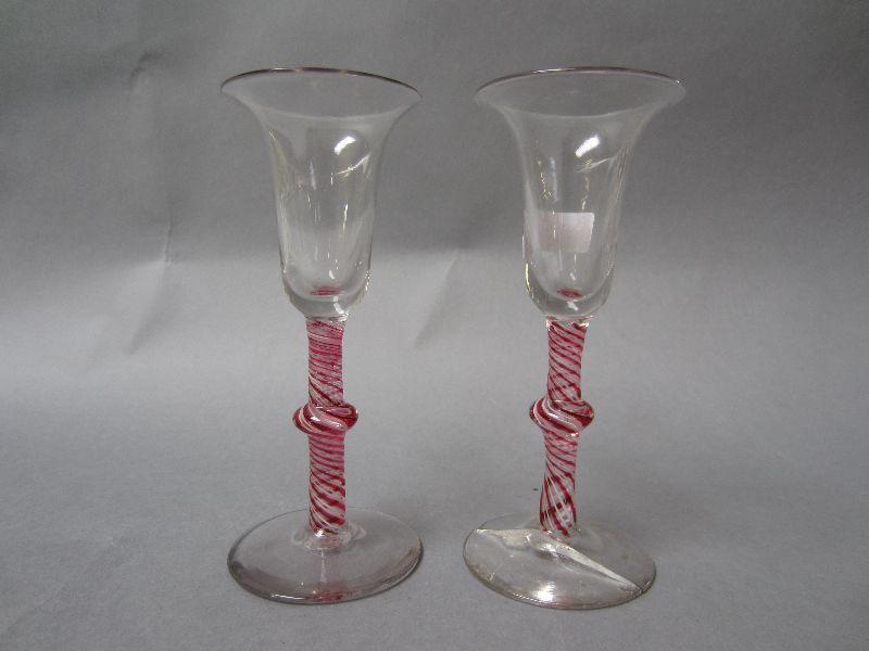 Pair of C18th airtwist stem wine glasses in cranberry & white 16.5H