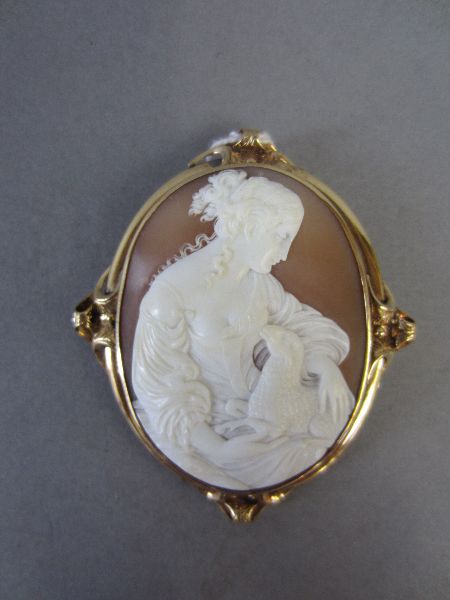 Gold mounted shell cameo brooch with relief carved maiden with lamb 6.5H