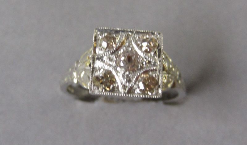 Art Deco platinum champagne diamond dress ring with white central stone