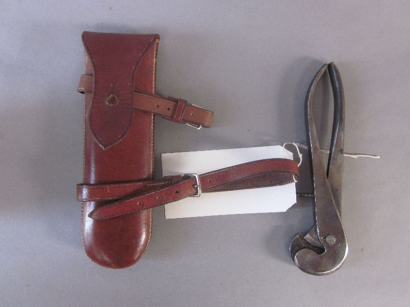 Pair wire cutters in leather saddle holder