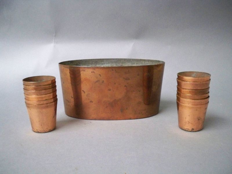 C19th tin lined copper creme caramel mould with 12 miniature moulds