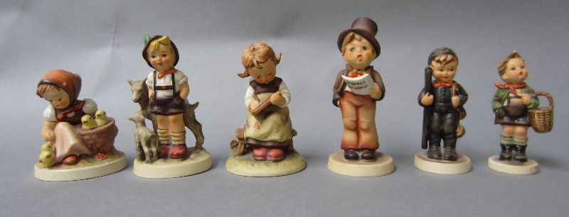 Collection of six Goebels figures; Chimney Sweep, Street Singer, Little Goat Herder, Village Boy,