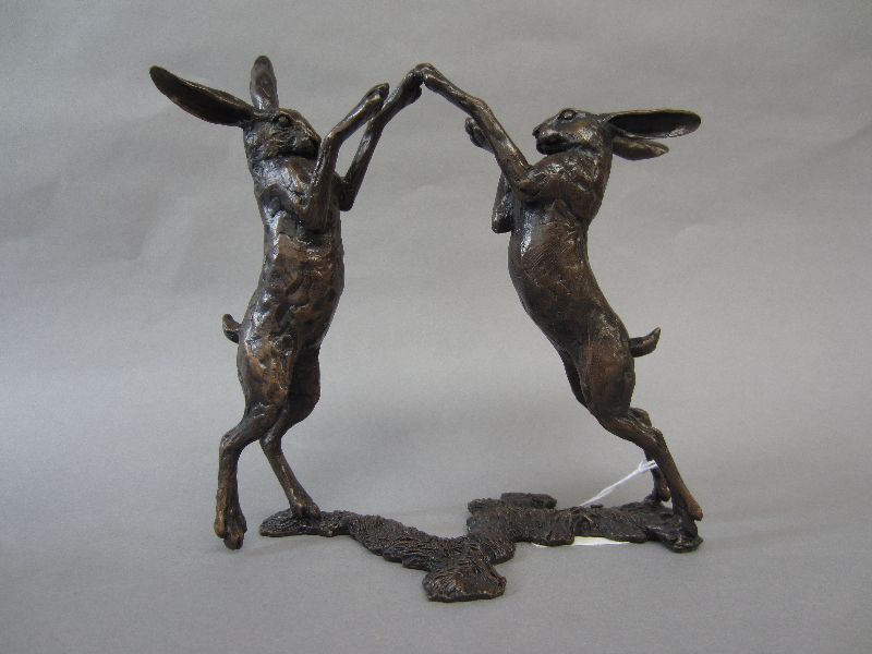 Bronze cast of boxing hares No 31/100 by Richard Cooper & company with original box 17x16