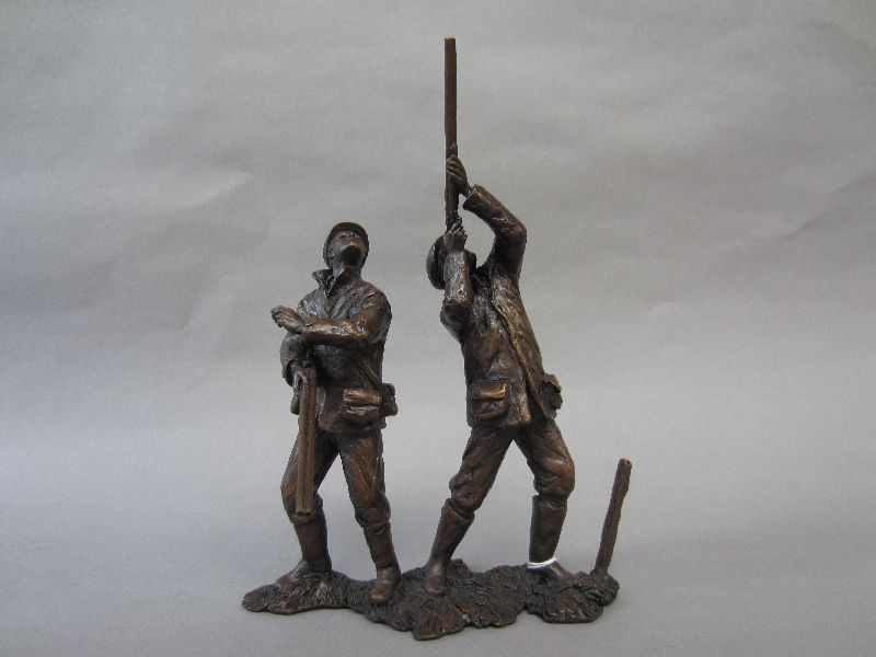 Bronze cast of a gun & loader No 52/75 by Richard Cooper & company, with original box