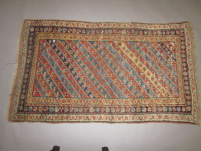 Two hand knotted eastern carpets, one with alternating stripes 207x120, the other with stylises