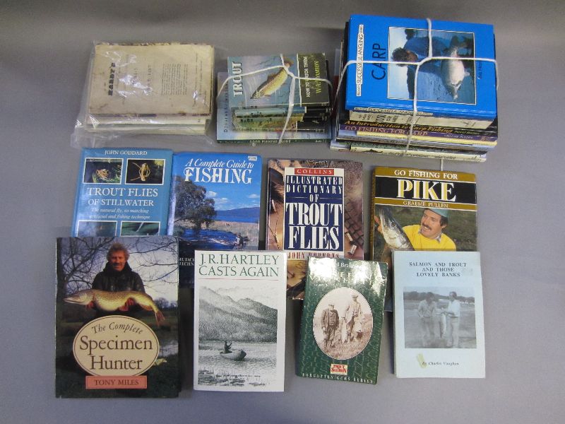 Two boxes of mixed fishing books and fishing catalogues