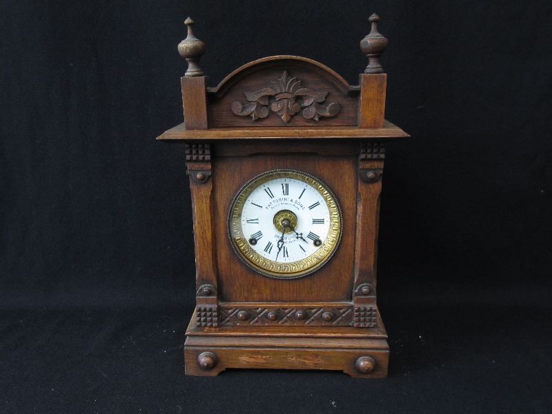 Edwardian oak mantel clock by Fattorini & Sons, automatic alarm 32H x 56 W, Edwardian mahogany cased