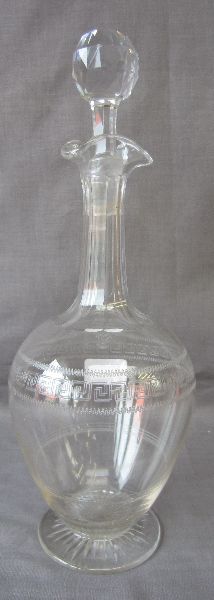 Edwardian lead crystal three spout decanter with Greek keywork and wriggle work banding.