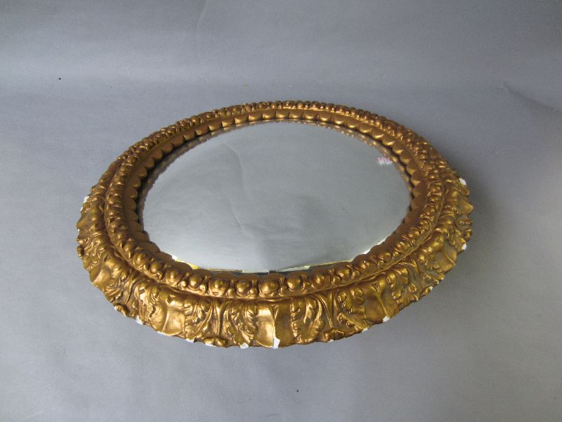 Pair of gilt framed convex wall mirrors