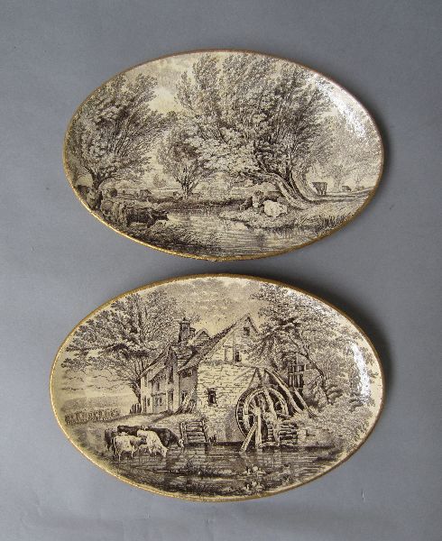 Pair of Copeland oval plates with transfer printed pastoral scenes 31w