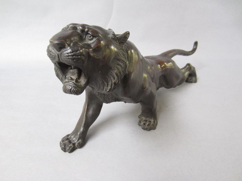 Chinese bronze casting of a tiger with seal mark to the underside 47 L