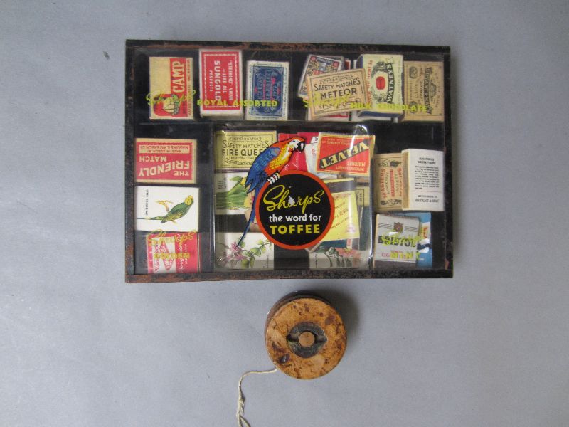 Vintage toffee tray box containing a matchbox collection, together with vintage wooden yo-yo