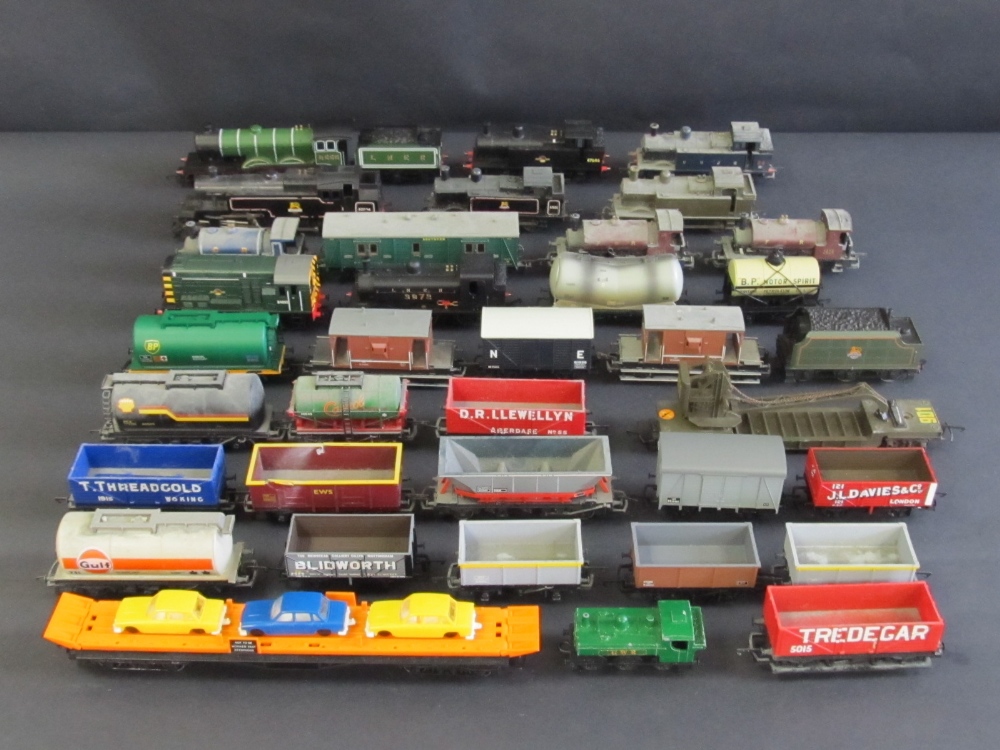 A large collection of unboxed Hornby OO gauge to include various locomotives and rolling stock.
