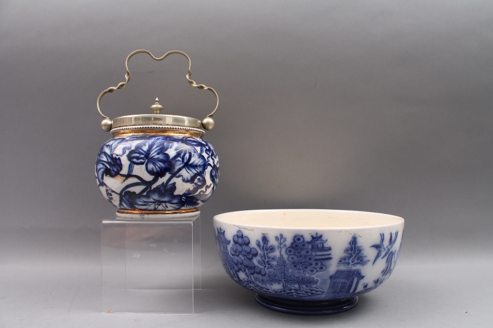 An Art Nouveau biscuit barrel with E.P.N.S. mounts and a Doulton Burslem `Willow` pattern bowl.