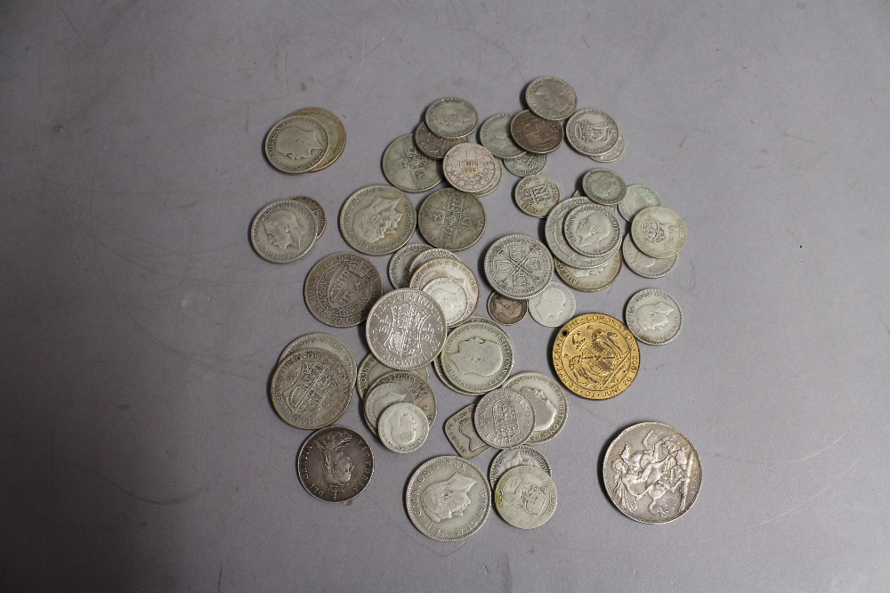 A quantity of pre-1947 British silver coins to include a Victorian crown 1895, an 1887 florin and